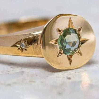 Golden Oval Asterism Zircon Simple Temperament Ring