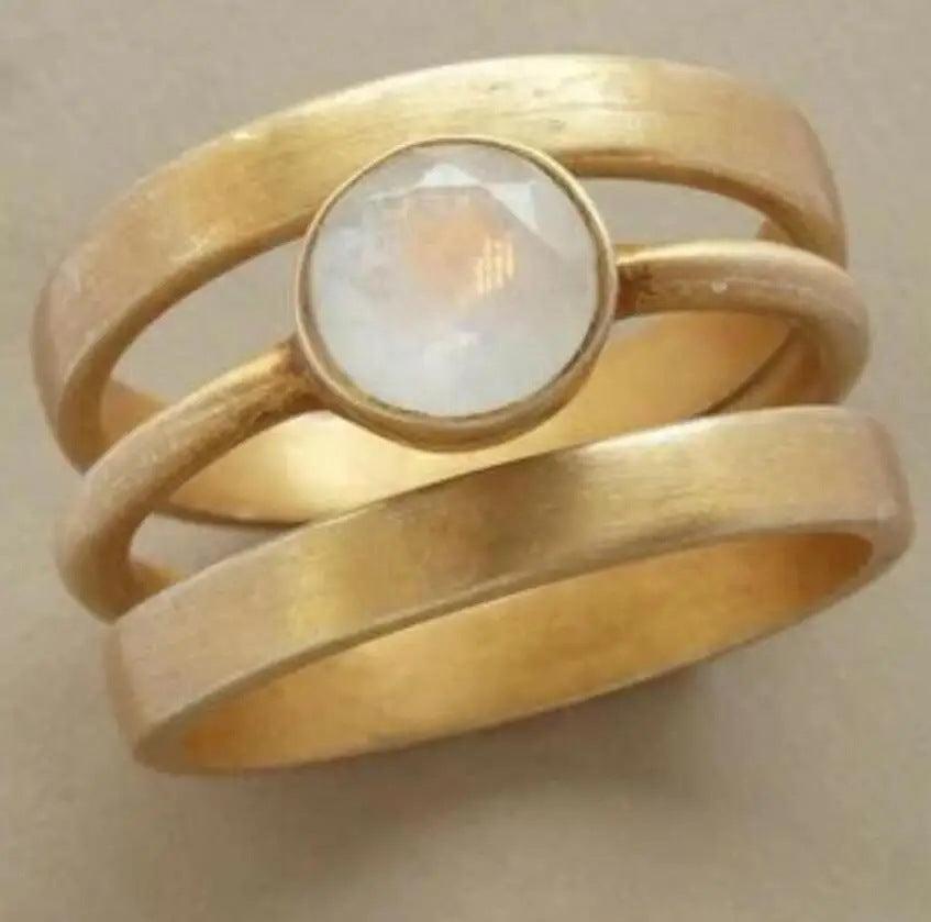 Fashion Gold-plated Hollow Micro-inlaid White Chalcedony Ring